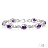 1/10 ctw Round Cut Diamond & 7x5MM Oval Cut Amethyst Semi Precious Bracelet in Silver